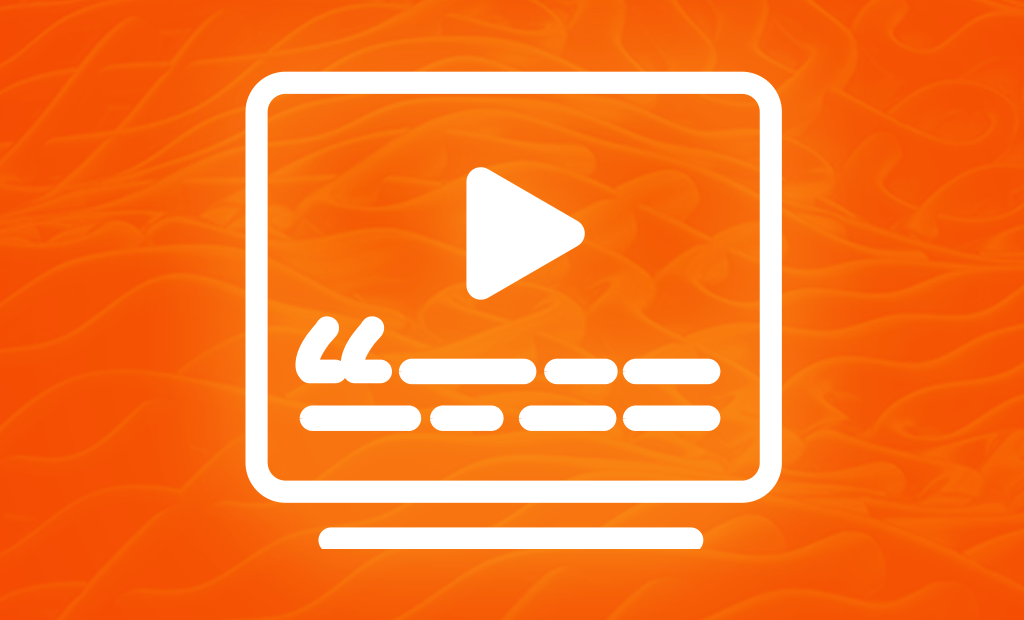 Retrospectiva da acessibilidade. Imagem de uma tela de computador com um play no meio e logo na parte de baixo uma legenda de descrição. 